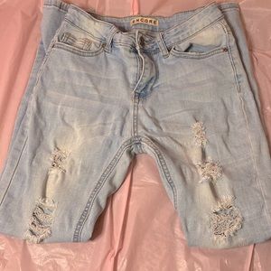 Distressed light wash jeans